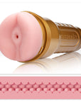 Fleshlight STU Stamina Training Unit med anus-öppning och guldfärgat fodral