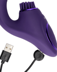 VIVE Gen Rabbitvibrator med Borste Lila med i kopplad USB-laddare mot vit bakgrund.