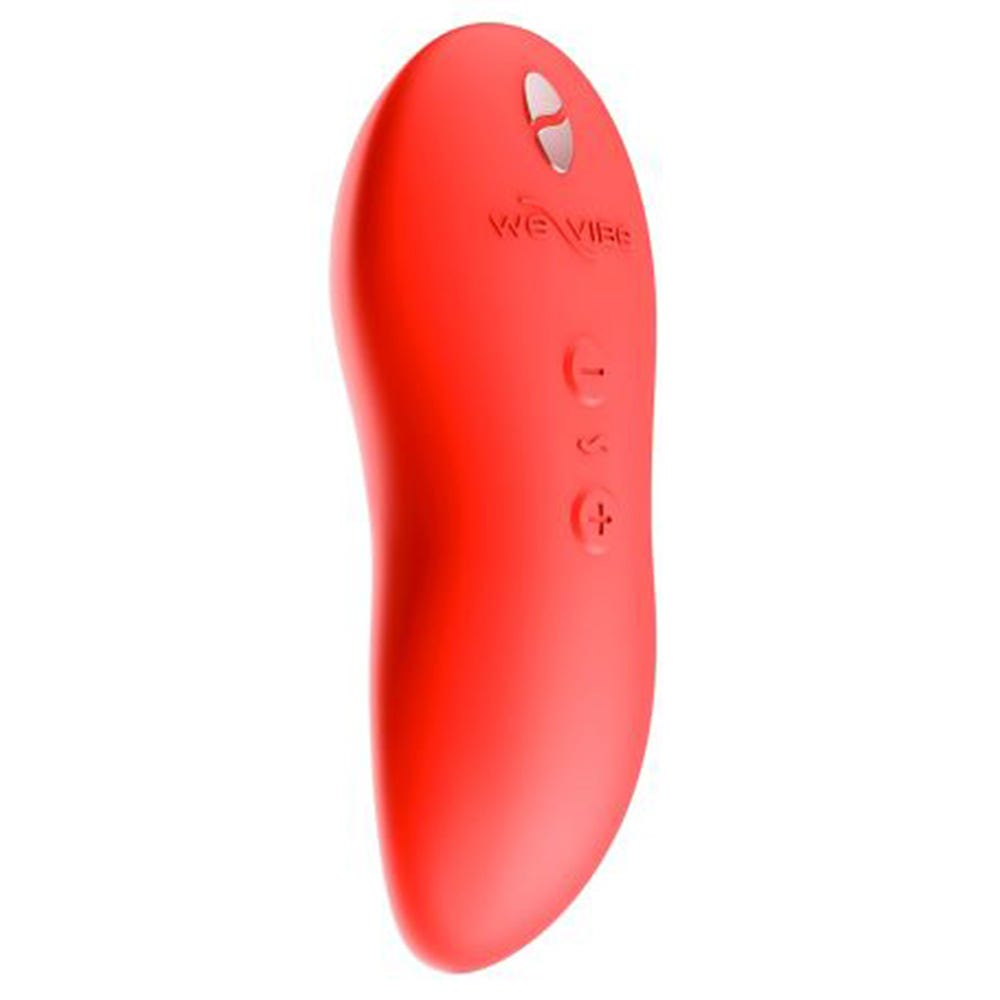 We-Vibe Touch X Crave Coral  ståendes mot vit bakgrund.