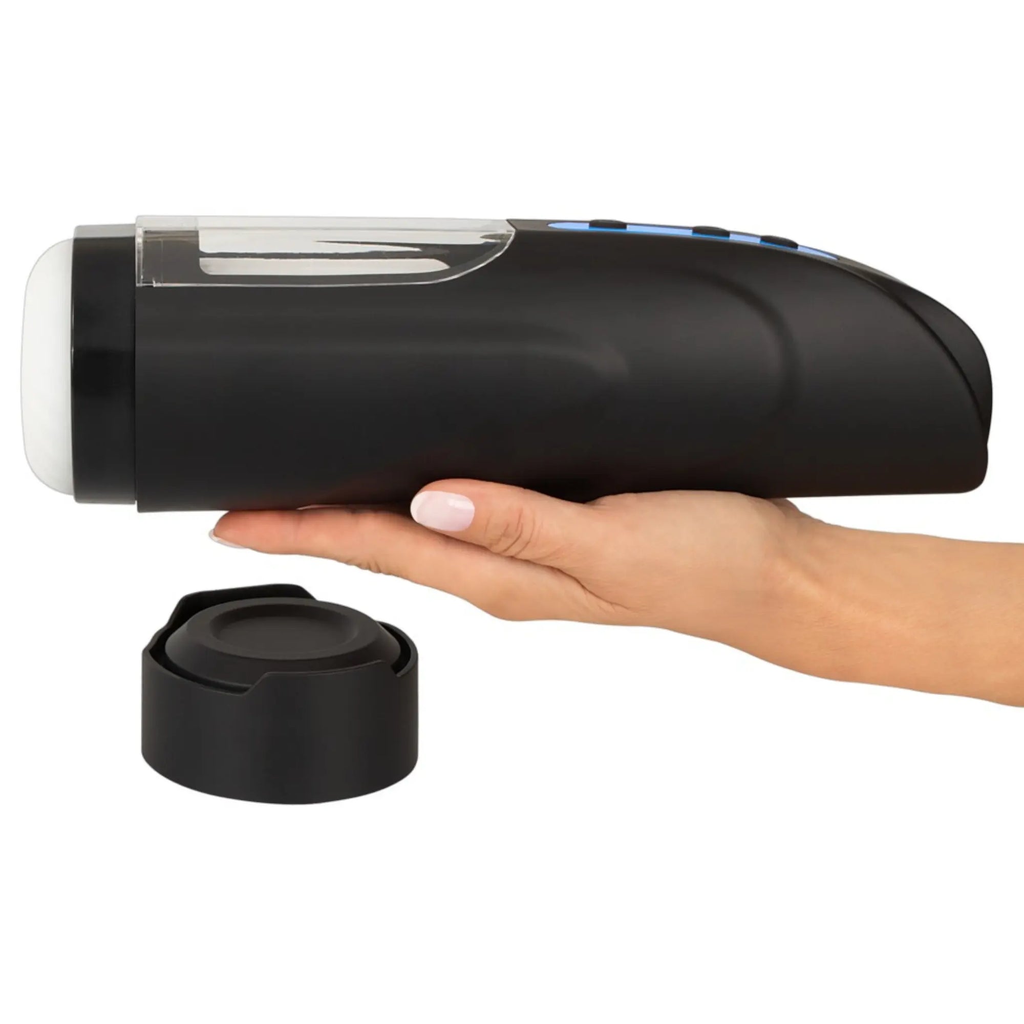 En hand håller i en WYNE Masturbator 09