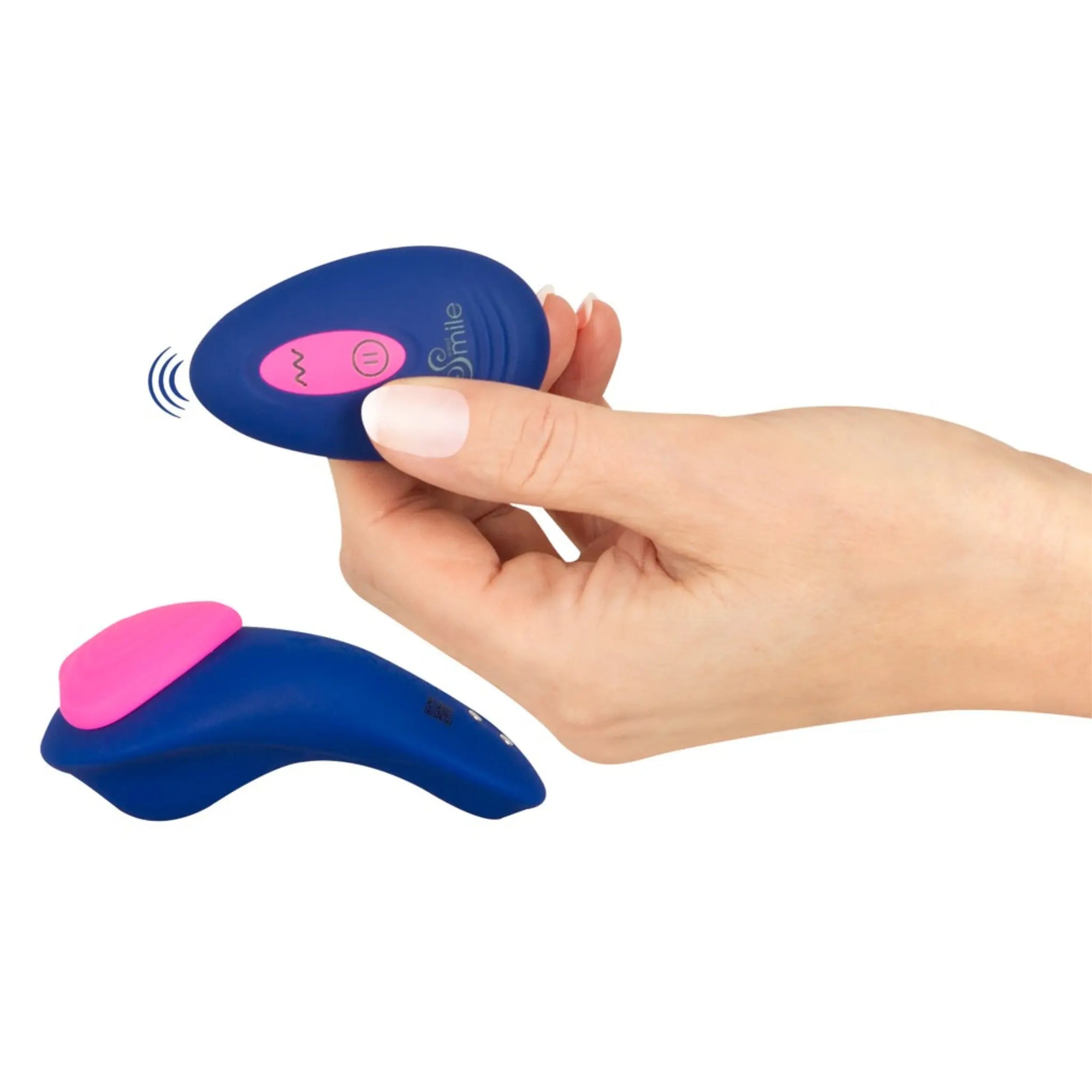 Hand håller i en Sweet Smile Heart Trosvibrator