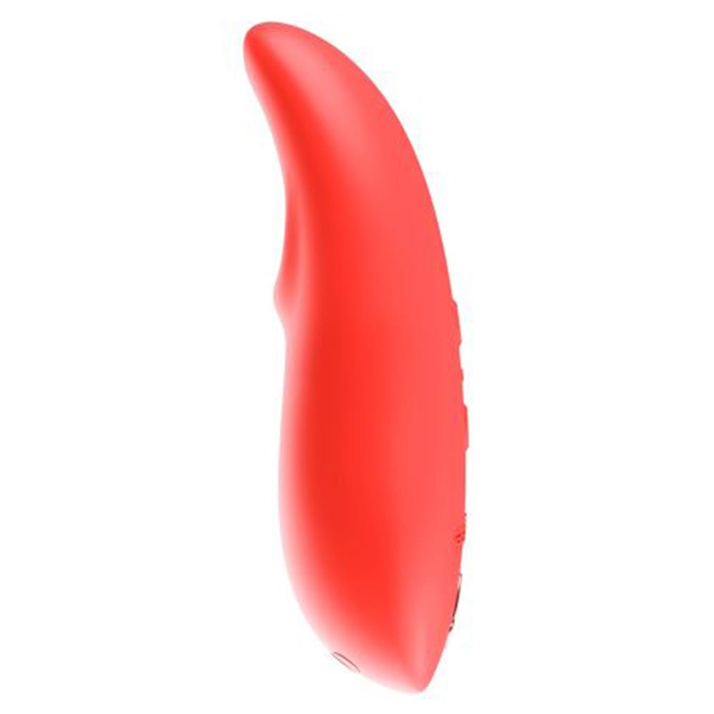 We-Vibe Touch X Crave Coral ståendes från sidan mot vit bakgrund.