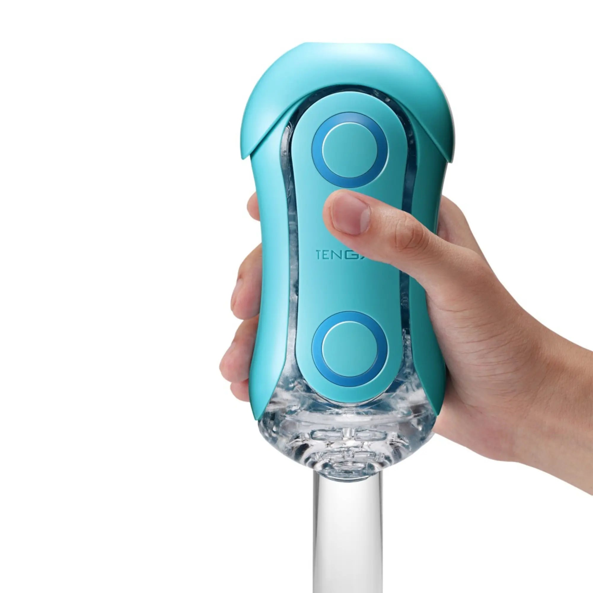 En hand håller i en Tenga Flip Orb Masturbator Blue