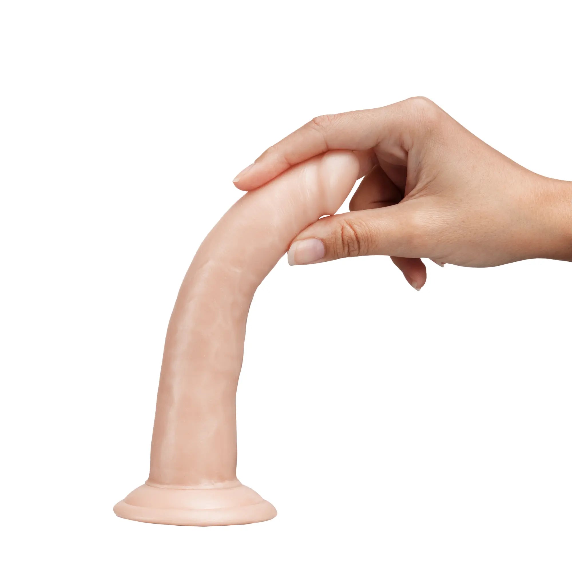 En hand håller i en Dr. Skin Realistic Dildo Flesh 19,5 cm Självsmörjande