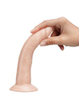 En hand håller i en Dr. Skin Realistic Dildo Flesh 19,5 cm Självsmörjande