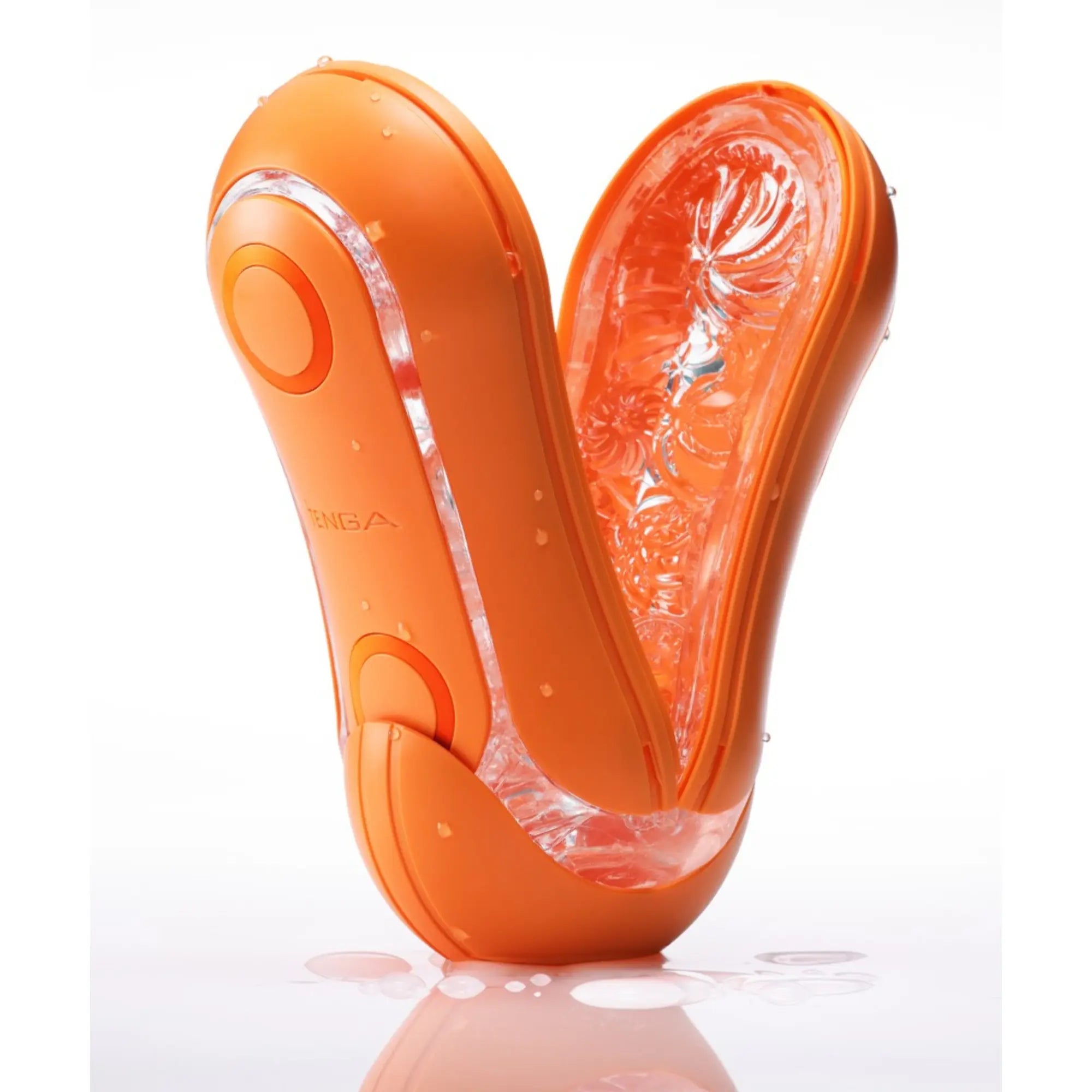 Tenga Flip Orb Masturbator Orange mot vit bakgrund