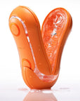 Tenga Flip Orb Masturbator Orange mot vit bakgrund