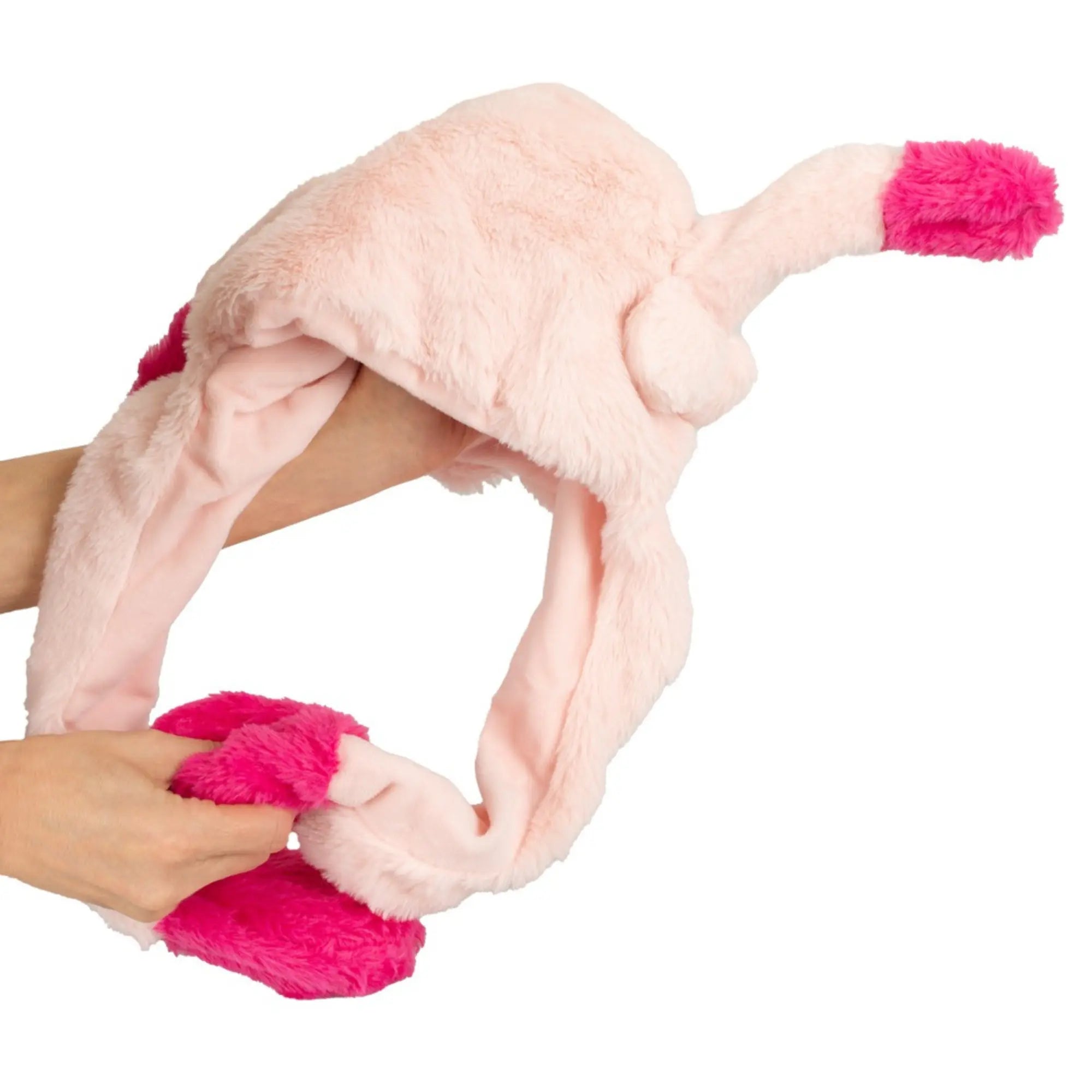 En hand håller i och visar upp Penis Mössa Skämtartikel