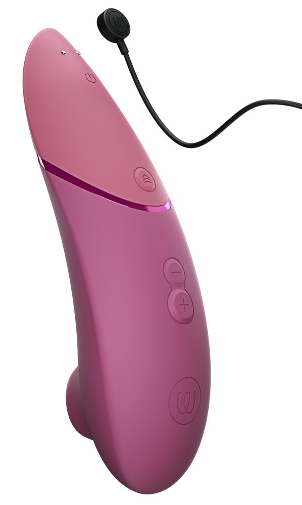 Womanizer Next rosa, sammetslen yta och knappar