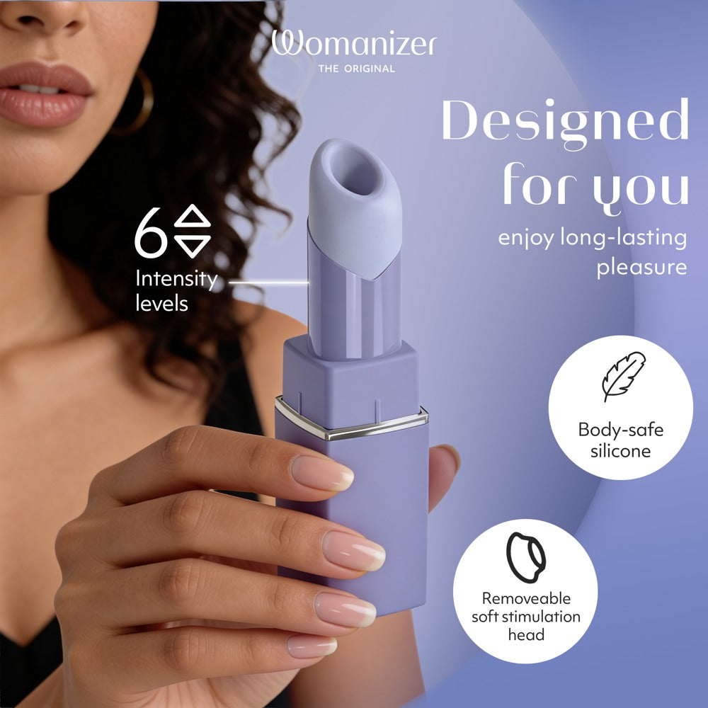 Lila Womanizer Beauty formad som ett läppstift, sidovy