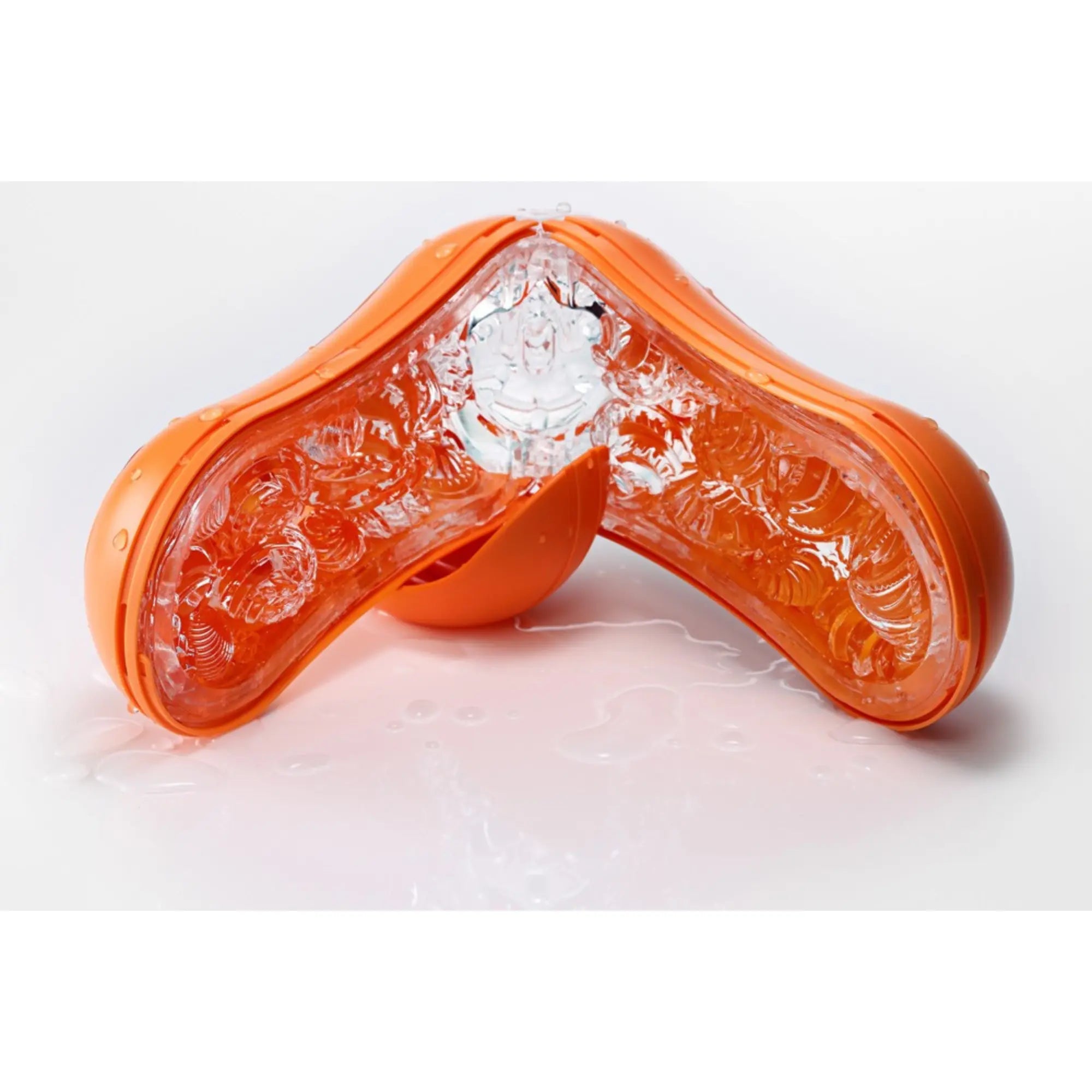 En öppen Tenga Flip Orb Masturbator Orange
