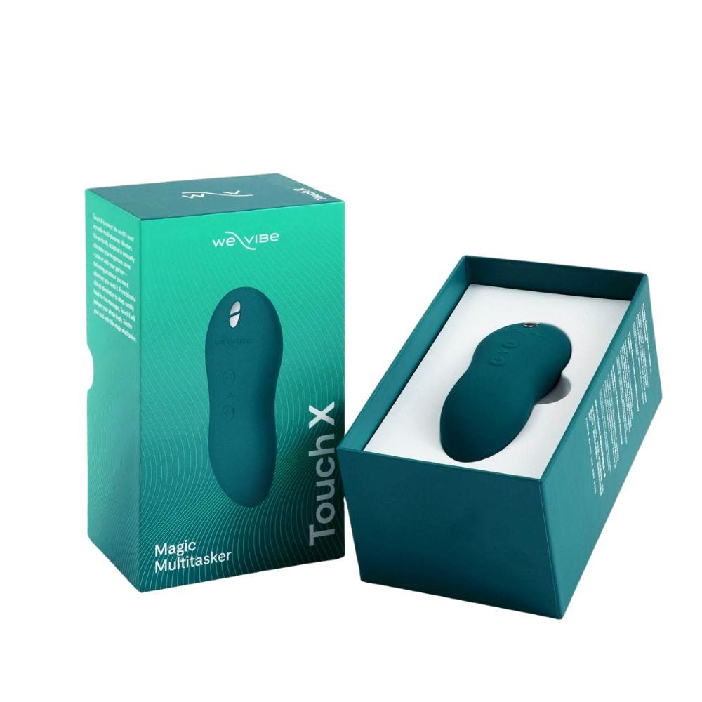 We-Vibe Touch X Green Velvet öppnad förpackning mot vit bakgrund.