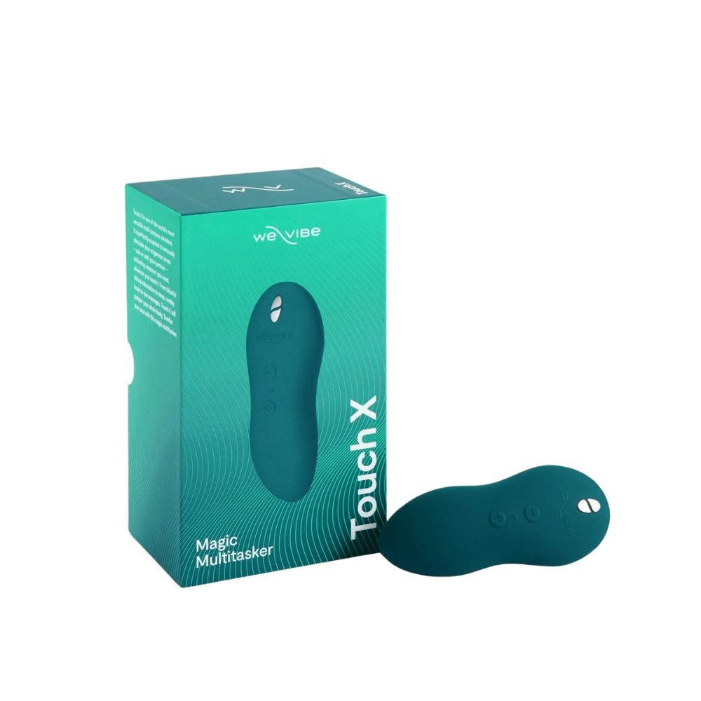 We-Vibe Touch X Green Velvet produktkartong och produkt mot vit bakgrund.