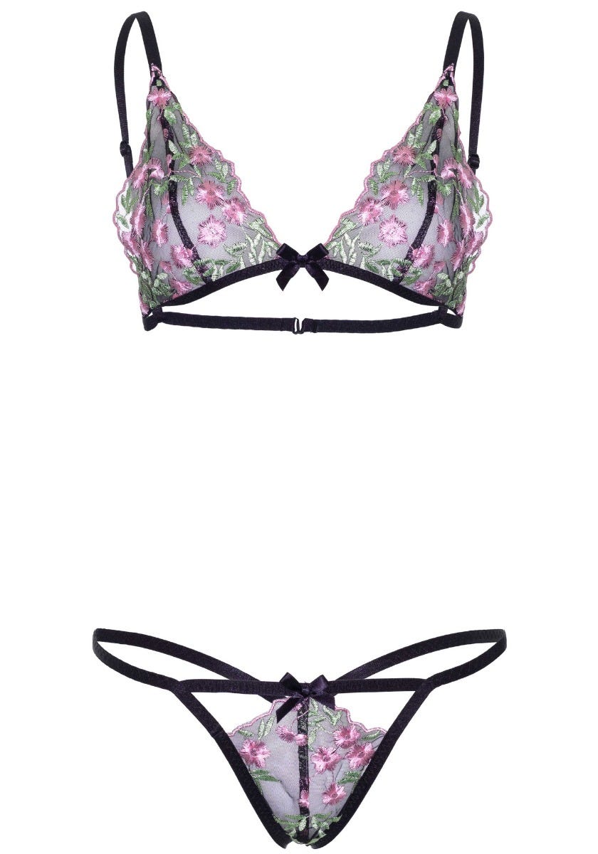 Floral Sheer Bra &amp; G-string mot vit bakgrund.