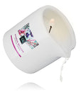 Exotiq Massage Candle Bamboo Orchids massageolja mot vit bakgrund.