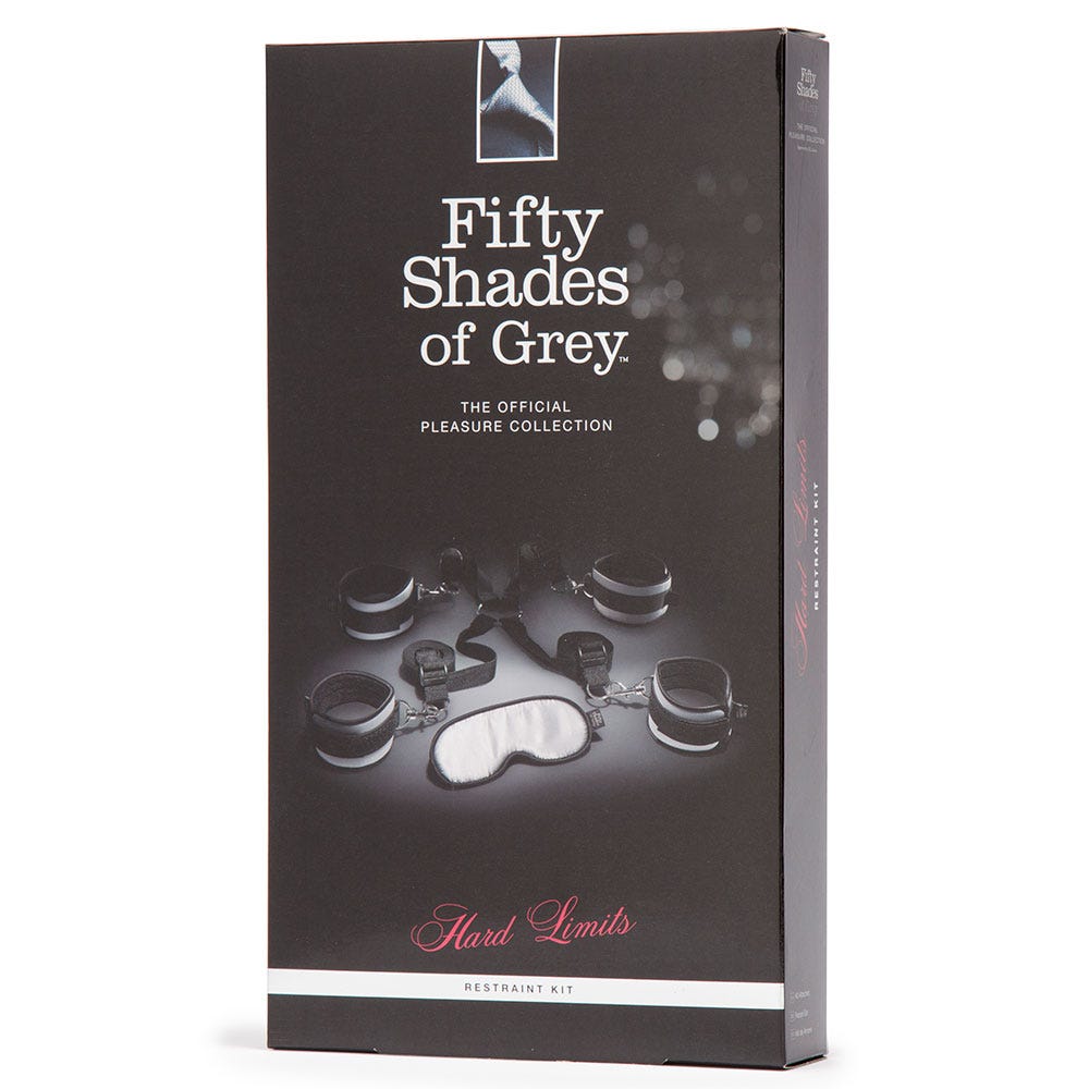 Svart förpackning till Fifty Shades Of Grey Bed Restraint Kit. Mot vit bakgrund. 