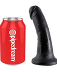 King Cock Dildo 15 cm Black bredvid en pantburk mot vit bakgrund.