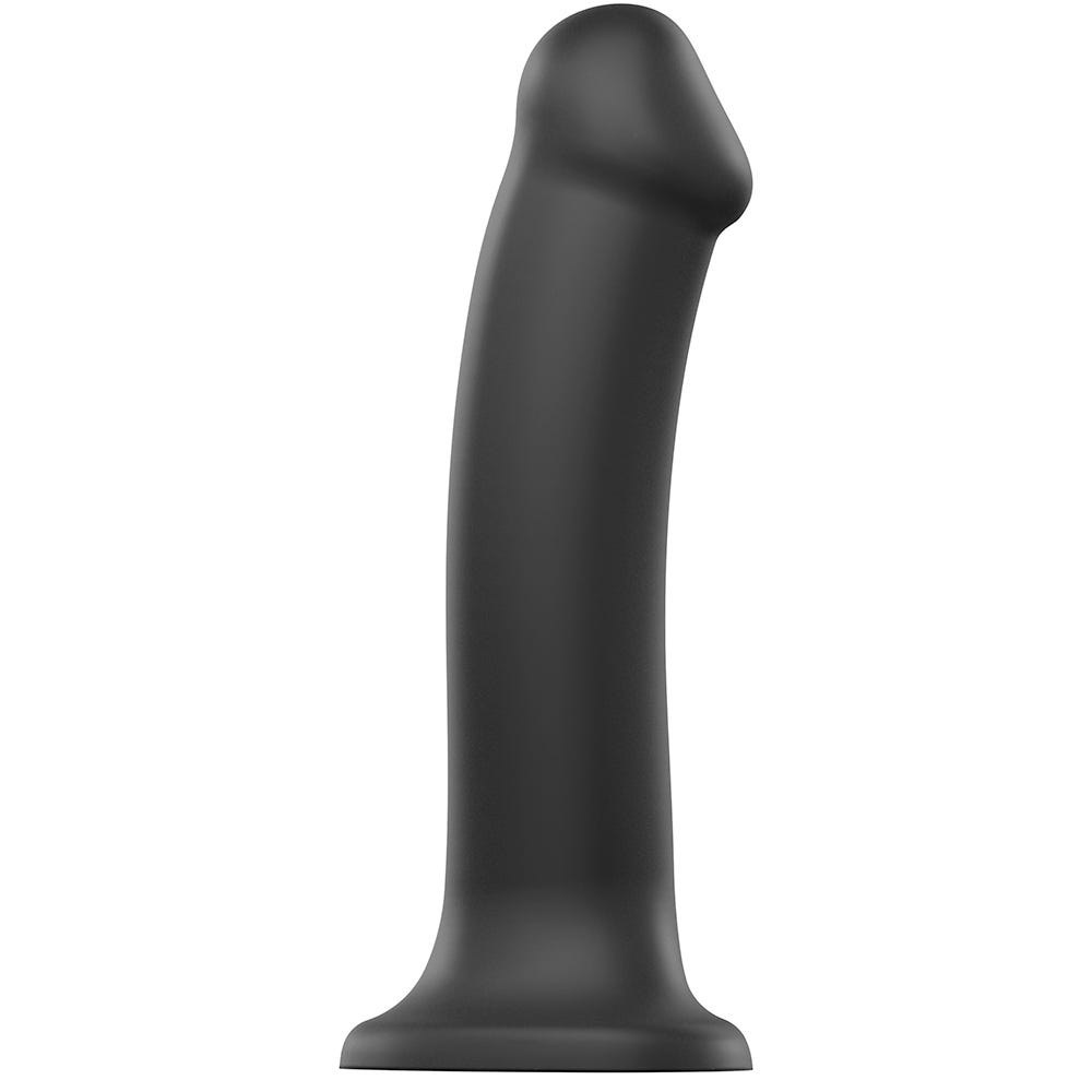 Dual Density Bendable Dildo L ståendes mot vit bakgrund.