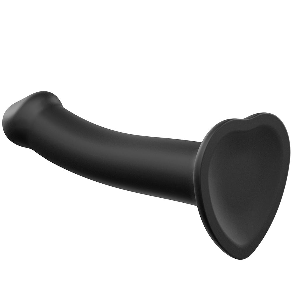 Undersida av Dual Density Bendable Dildo M mot vit bakgrund.