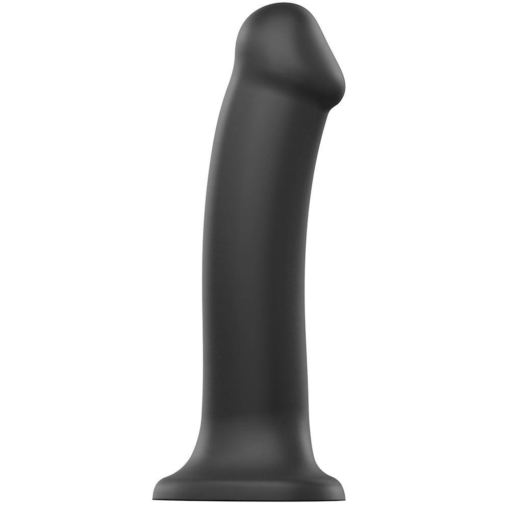 Dual Density Bendable Dildo S ståendes mot vit bakgrund.