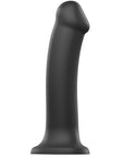 Dual Density Bendable Dildo S ståendes mot vit bakgrund.