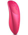 fjärrkontroll till We-Vibe Chorus Cosmic Pink Samlagsvibrator. Rosa med fem knappar. Vit bakgrund.