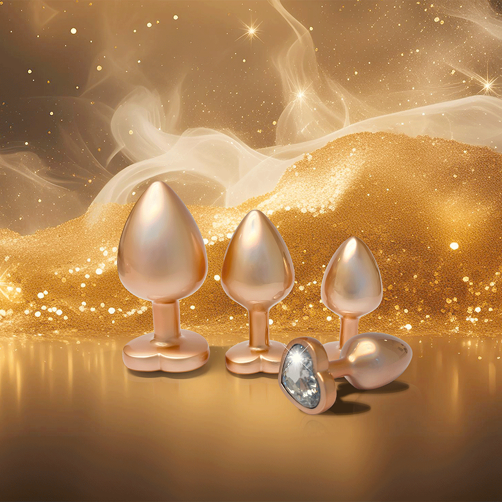 Moodbild på DreamToys Gleaming Love Gold Buttplug Set.