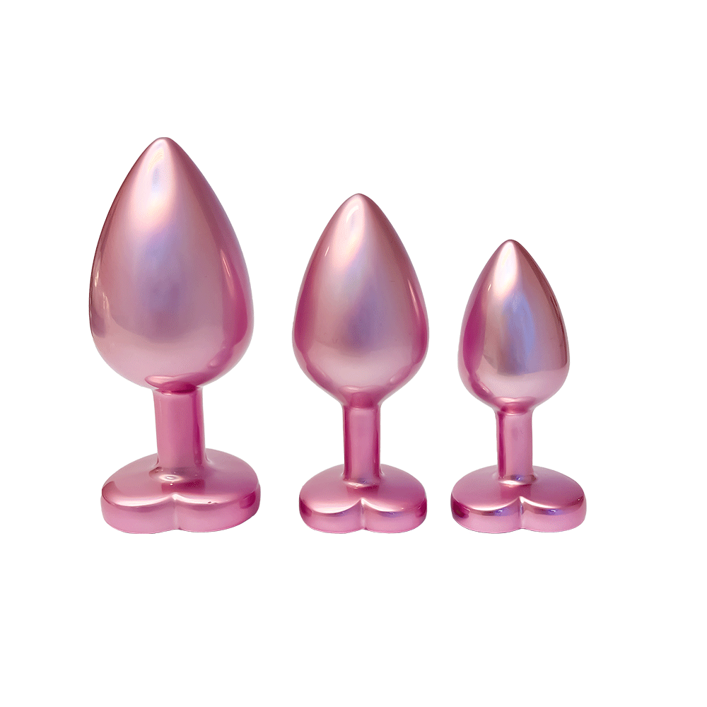 DreamToys Love Pearl Pink Plug Set mot vit bakgrund. Köp analpluggar på Lustly.se