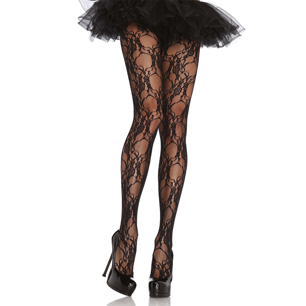 Kvinnliga ben klädda i Floral Lace Pantyhose mot vit bakgrund.