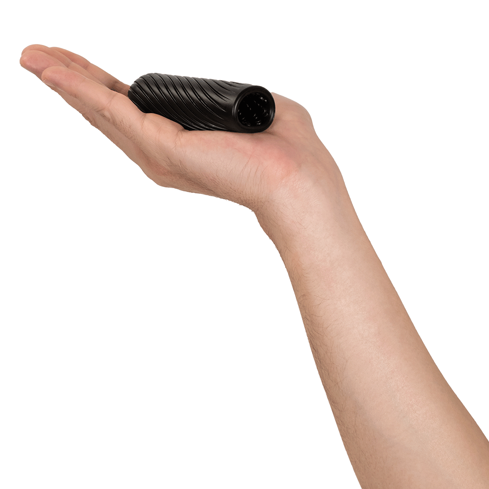 Arcwave Ghost Pocket Stroker Black som ligger i en öppen hand. 