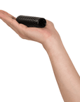 Arcwave Ghost Pocket Stroker Black som ligger i en öppen hand. 