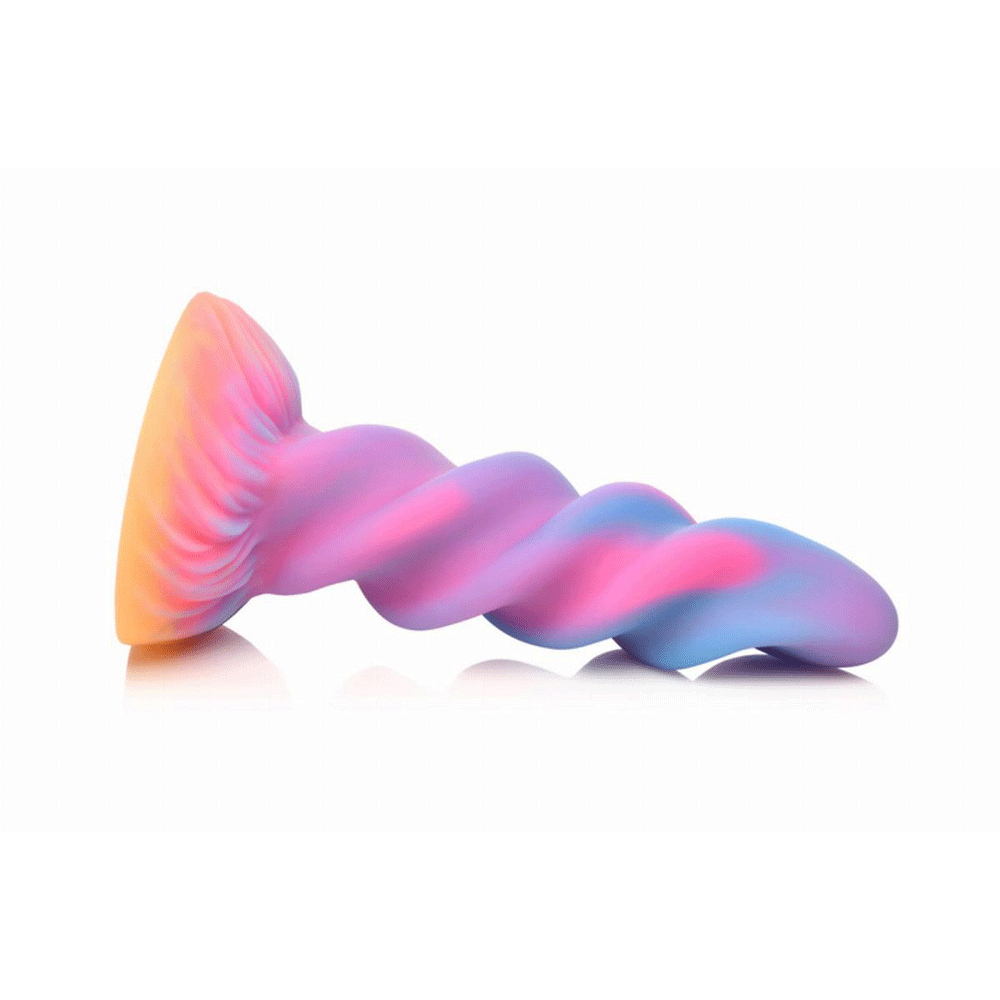 Glow-in-the-Dark Unicorn Dildo liggandes mot vit bakgrund.