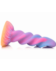 Glow-in-the-Dark Unicorn Dildo liggandes mot vit bakgrund.