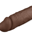 Närbild på Real Fantasy - Waylon Realistic Dildo - 25 cm mot vit bakgrund.