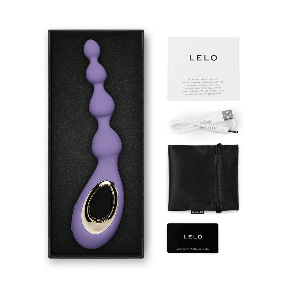 LELO Soraya Beads Violet Dusk och tillbehör mot vit bakgrund.