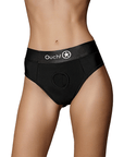 Modell med Ouch! Vibrating Strap-on Thong with Removable Rear Straps på sig mot vit bakgrund. Framsida.