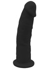 Real Love Dildo 15,2 cm Black ståendes mot vit bakgrund.