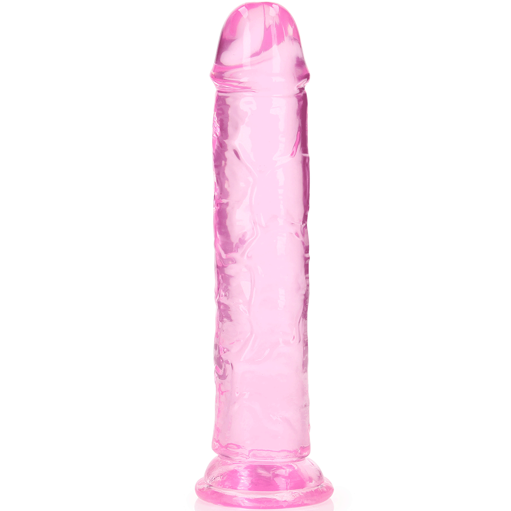 En ny vinkel av RealRock Dildo with Suction Cup Pink 20cm. Genomskinlig dildo i rosa färg mot vit bakgrund.