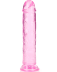 En ny vinkel av RealRock Dildo with Suction Cup Pink 20cm. Genomskinlig dildo i rosa färg mot vit bakgrund.