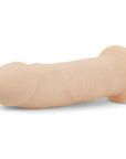 RF Deluxe Harris Realistic Dildo liggandes mot vit bakgrund.