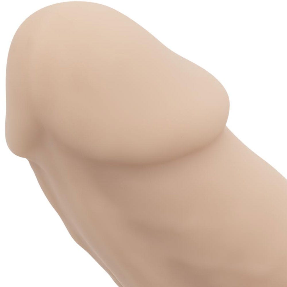 RF Deluxe Realistic Dildo Xavier närbild på ollonet mot vit bakgrund.