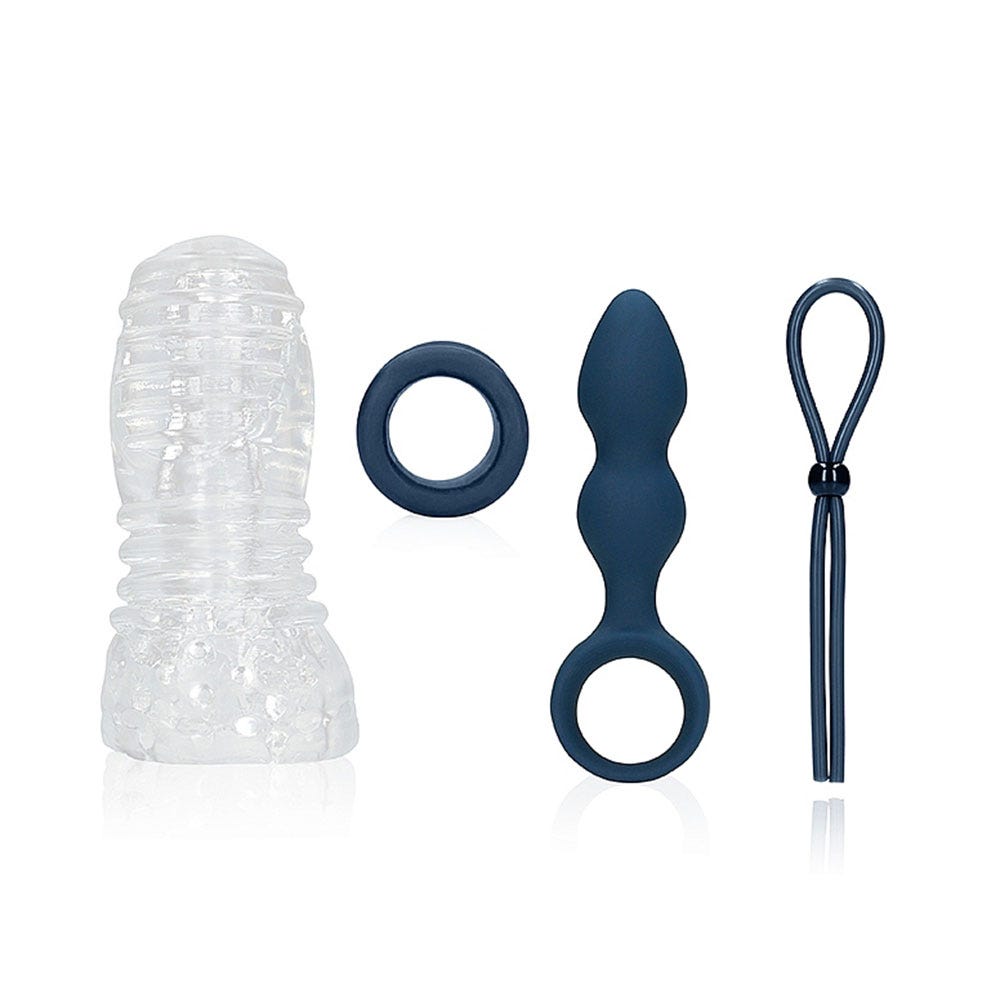 (S)explore Toy Kit for Him masturbator, penisring, analplugg och ball strap mot vit bakgrund.