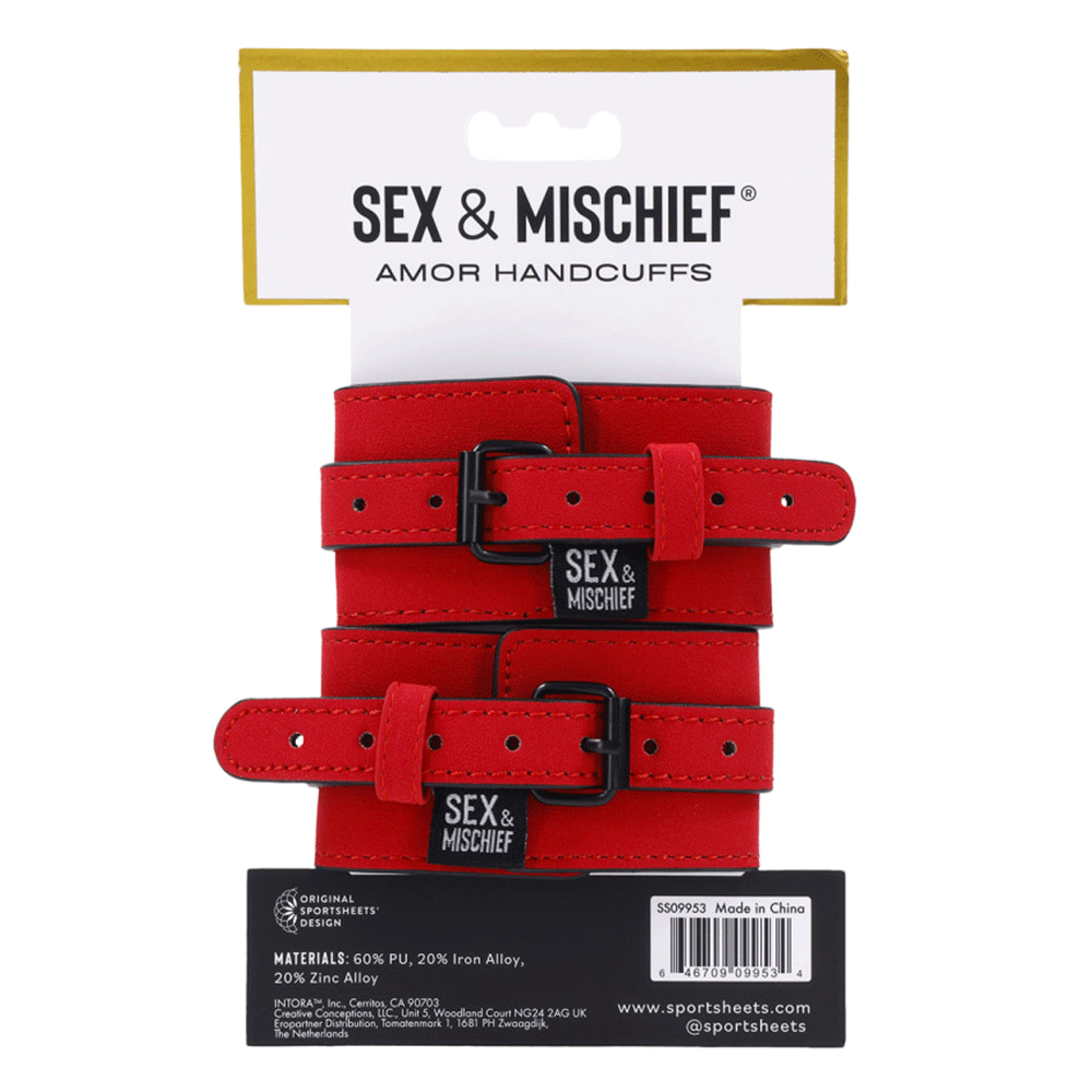 Sex &amp; Mischief Amor Handcuffs produktförpackning, baksida mot vit bakgrund.