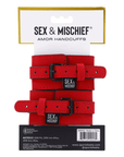 Sex & Mischief Amor Handcuffs produktförpackning, baksida mot vit bakgrund.