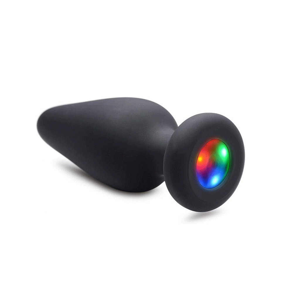 Silicone Light Up Butt Plug Small liggandes mot vit bakgrund. Lustly.se