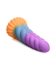 Silicone Unicorn Dildo liggandes mot vit bakgrund.