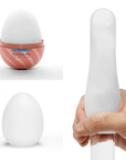 Tenga Egg Spiral mot vit bakgrund. Öppen förpackning. Köp runkägg och sexleksaker för män på Lustly.se