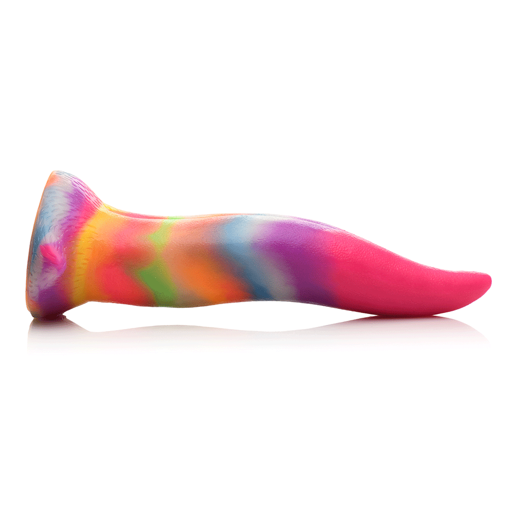 Unicorn Tongue Glow in the Dark Silicone Dildo liggandes mot vit bakgrund. Sidvinkel.