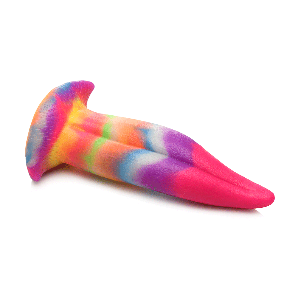 Unicorn Tongue Glow in the Dark Silicone Dildo liggandes mot vit bakgrund.