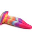 Unicorn Tongue Glow in the Dark Silicone Dildo liggandes mot vit bakgrund.